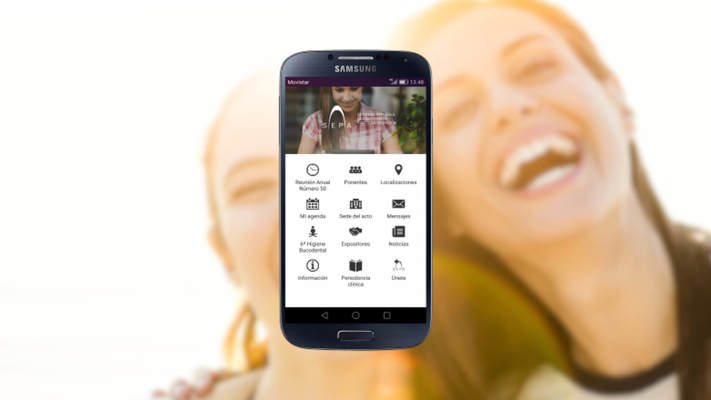 Smartphone with SEPA native app. Background of 2 loyal customers of the brand